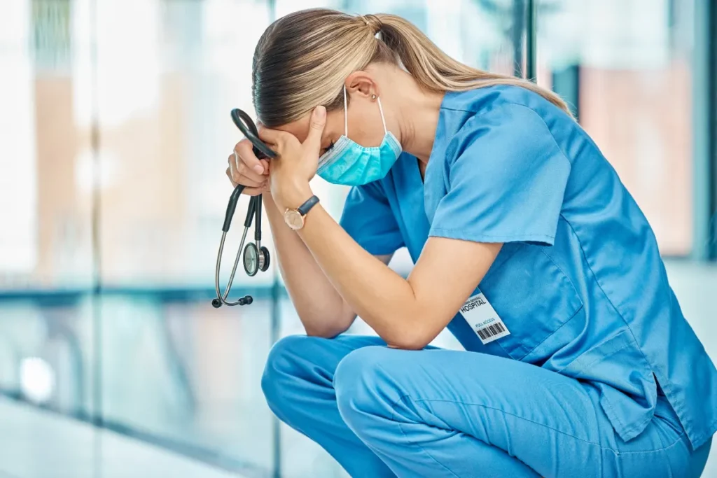 nurse in a scared and stressed state
